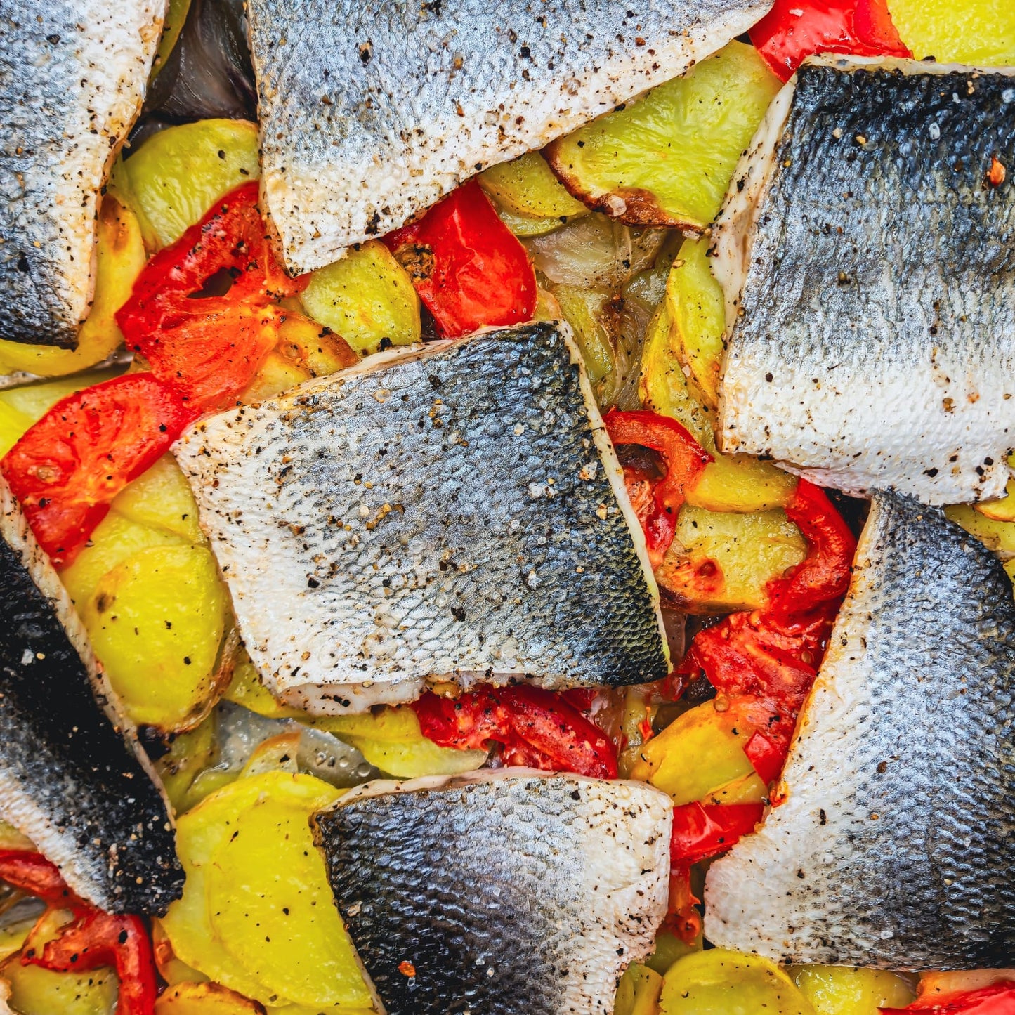 LLOBARRO AL FORN AMB PATATES