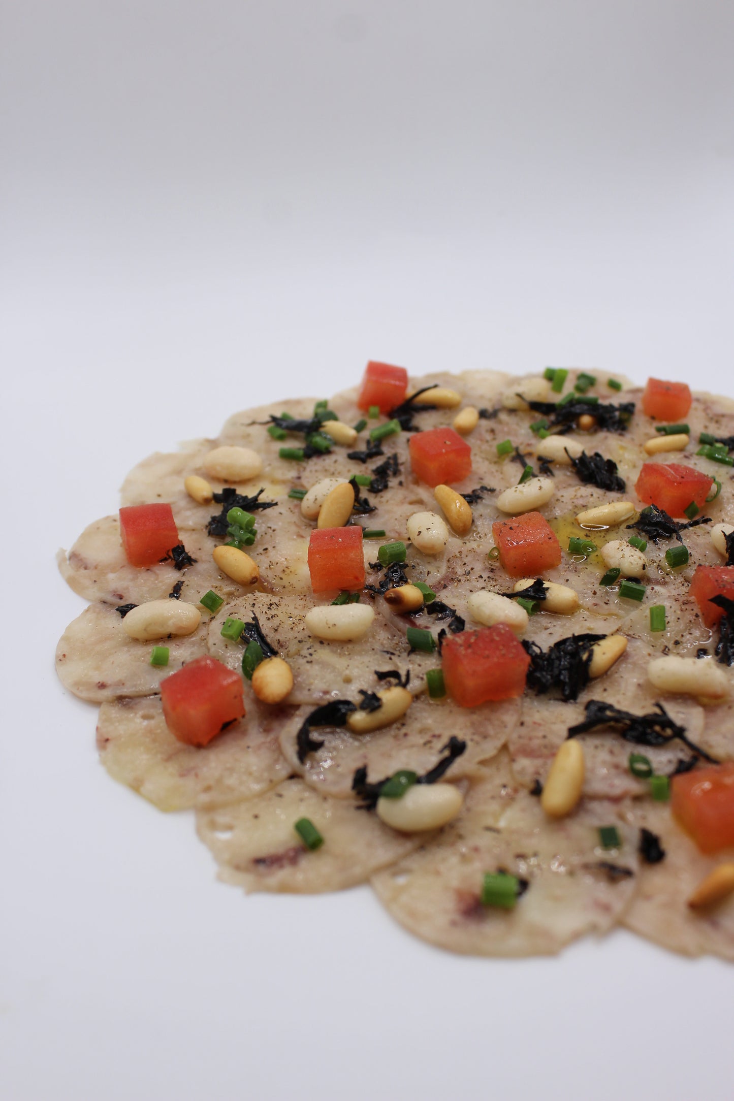 CARPACCIO PEUS DE PORC